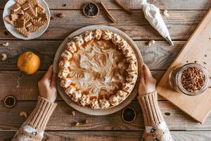 Decorating process of  Pumpkin Cheesecake - Thanksgiving dessert photo
