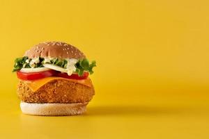 Crispy chicken burger with cheese photo