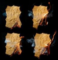 burning piece of crumpled paper photo