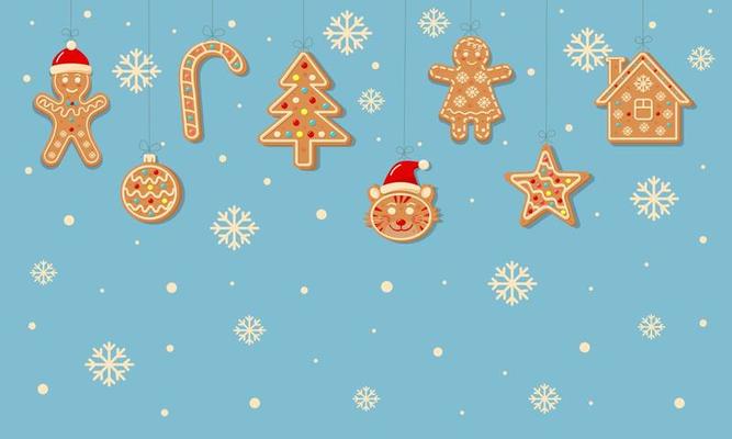 Christmas background with hanging gingerbread cookies.