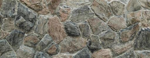 The stone wall texture pattern background photo
