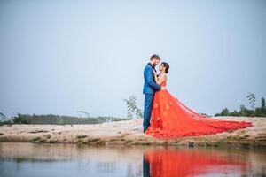 Asian bride and Caucasian groom have romance time and happy together photo