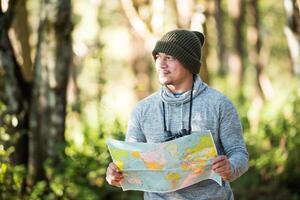 Men traveller going alone in the wild photo