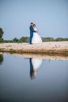 Asian bride and Caucasian groom have romance time and happy together photo