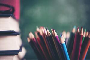 school stationary on wooden table photo