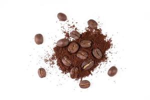 roasted coffee bean with powder on white background photo