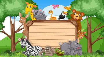 Empty wooden board with various wild animals in the forest vector