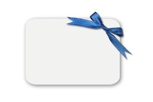 arco en una tarjeta de regalo en blanco blanco foto