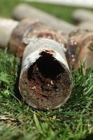 Corroded and Blocked Steel Household Pipes photo