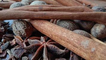 Photos of authentic Indonesian spices such as cinnamon, anise, cumin and nutmeg