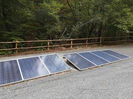 solar panels placed on the ground photo