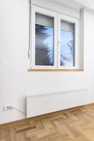 Smart heater convector. Smart Home with the smart heating system. Electric panel heating concept. photo