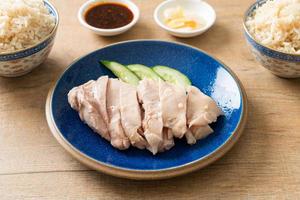 Hainanese chicken rice or rice steamed with chicken soup photo