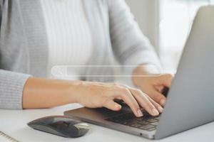 Woman using a laptop computer to Searching for information with the Search bar, Web browser, Data Search, Search Engine, Technology Concept photo