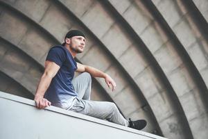 strong sportsman resting in the fresh air photo