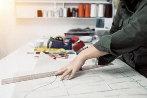 Tailor working design for clothing in the tailor shop photo