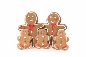 Five Gingerbread People Against a White Background photo