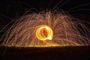 Beautiful circle of sparks at night photo
