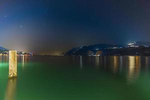 Night in the small port of Malcesine. Magic of Lake Garda. photo