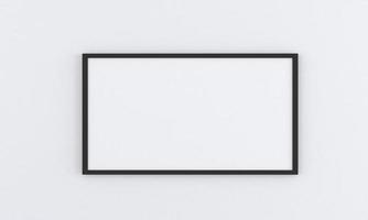 Black empty frame mockup on gray wall photo