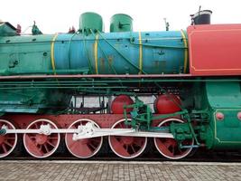 Railway locomotive, wagons in the train photo