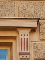 Classical architecture of the city, stone details and decoration photo