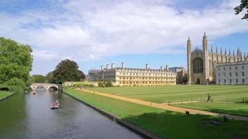 Punt trip in River Cam around college buildings in Cambridge, UK video