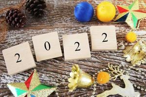 feliz navidad y próspero año nuevo 2022 concepto de fondo foto