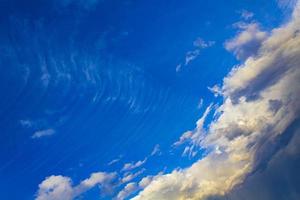 Blue sky with beautiful wavy clouds in Norway photo