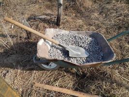 Construction work and tools on the garden photo