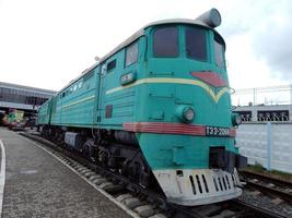 Railway locomotive, wagons in the train photo