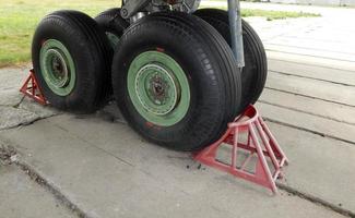 Aviation chassis of an airplane and a helicopter at the airport photo