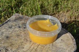Fresh summer honey in a jar photo
