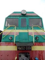 Railway locomotive, wagons in the train photo