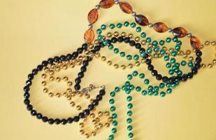Multicolored beads as an isolated object on a background photo