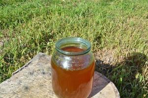 Fresh summer honey in a jar photo