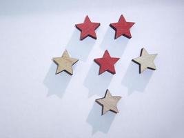Red and yellow stars on a white background photo