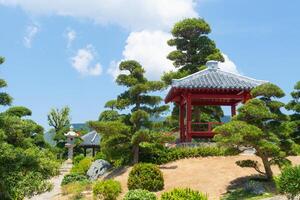 japanese style garden with pagoda and trees