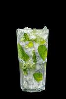 Summer drink with lime and mint isolated black photo
