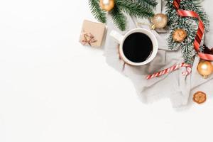 Minimal creative flat lay of christmas traditional composition and new year holiday season. Top view winter christmas decorations on white background with blank space for text. Copy space photography. photo