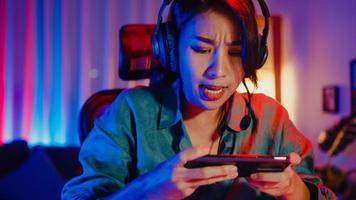 Asian Cute Girl Streaming Play Game Online Using Controller and Talking  with Fan Club from Microphone and Headset in Gamer Neon Stock Photo - Image  of internet, cheerful: 282549384