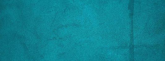 Turquoise background natural suede with a dark edge and a light center. Horizontal web banner. photo