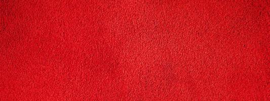 Red suede leather texture. Macro photo of a red velvet texture.