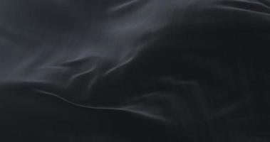 zwarte doek of zijde zwaaiend naar de wind in langzame, lus video