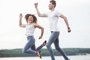 young couple have fun in the summer photo