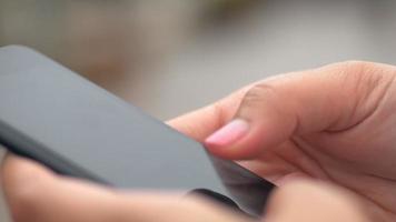 Close Up hands woman using mobile. video