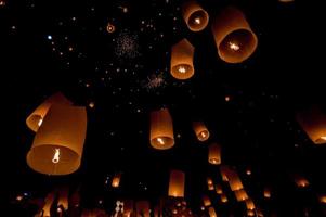 Floating lantern in Yee Peng festival Loy Krathong, Buddhist floating lanterns to the Buddha in Sansai Thailand photo