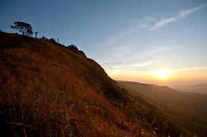 Beautiful Fog and sunrise on the top Moutain photo