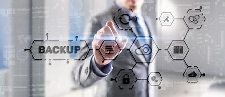 Backup Storage Data Technology concept. Businessman touching Backup photo