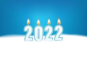 Número 2022 en la nieve. números de velas de cera en la nieve vector